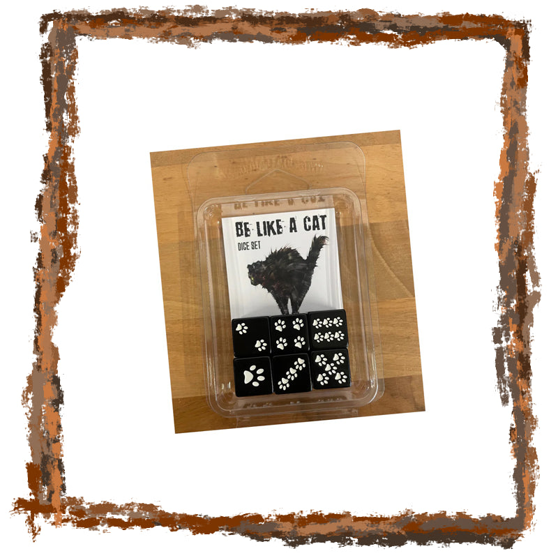 Packaging with a cat illustration and text 'Be Like a Cat' on a wooden surface.