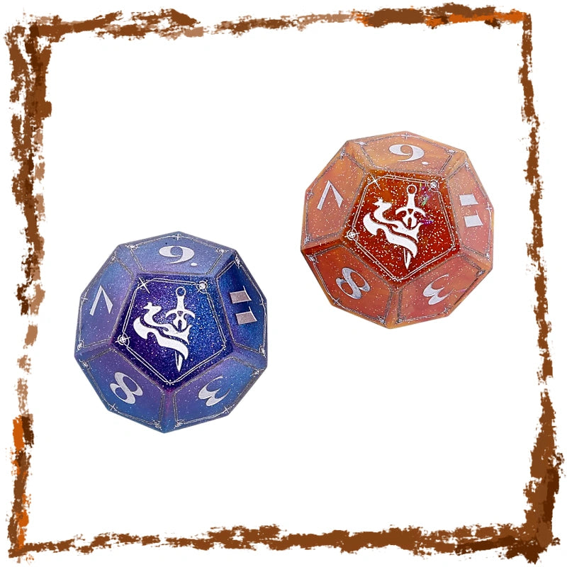 Two polyhedral d20 dice on a white background with a distressed brown border. One die is translucent blue with white printed numbers and a Daggerheart symbol, and the other is translucent orange-red with white printed numbers and the same symbol.