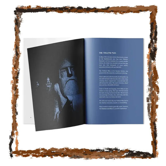 Open book with a black and white illustration on one page and text on the other, framed with a brown border.