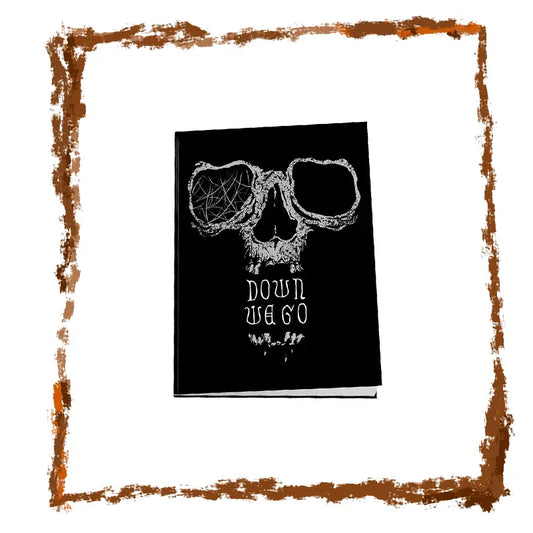 Black notebook with skull design and text 'Down We Go' on a white background