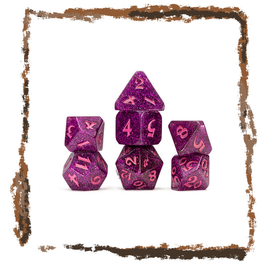 Set of purple glitter polyhedral dice with pink numbers on a white background